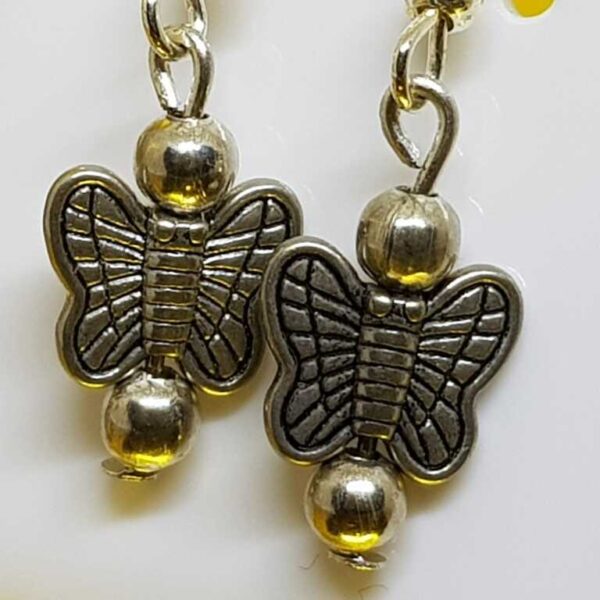 Silver Coloured Hanging Butterfly Earrings on Silver Coloured Posts - Image 4